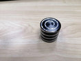 Load image into Gallery viewer, Perpetual Motion Desk Spinner - Kinetic Desk Toy
